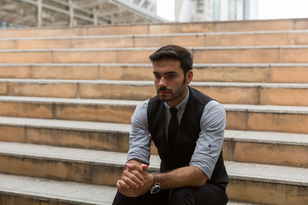 Entrepreneur sitting at a staircase