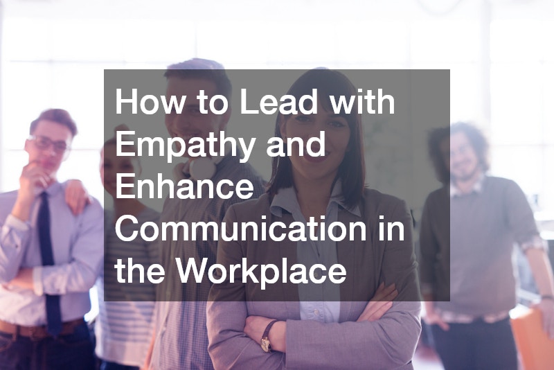 leader smiling proudly with her arms crossed, standing in front of a diverse group of employees