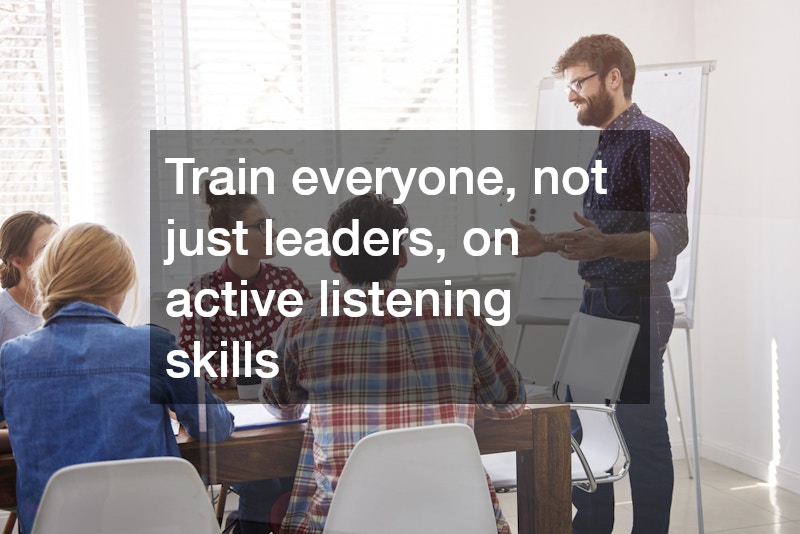 employees listening attentively to their manager in a conference room
